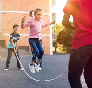 young students with jump rope